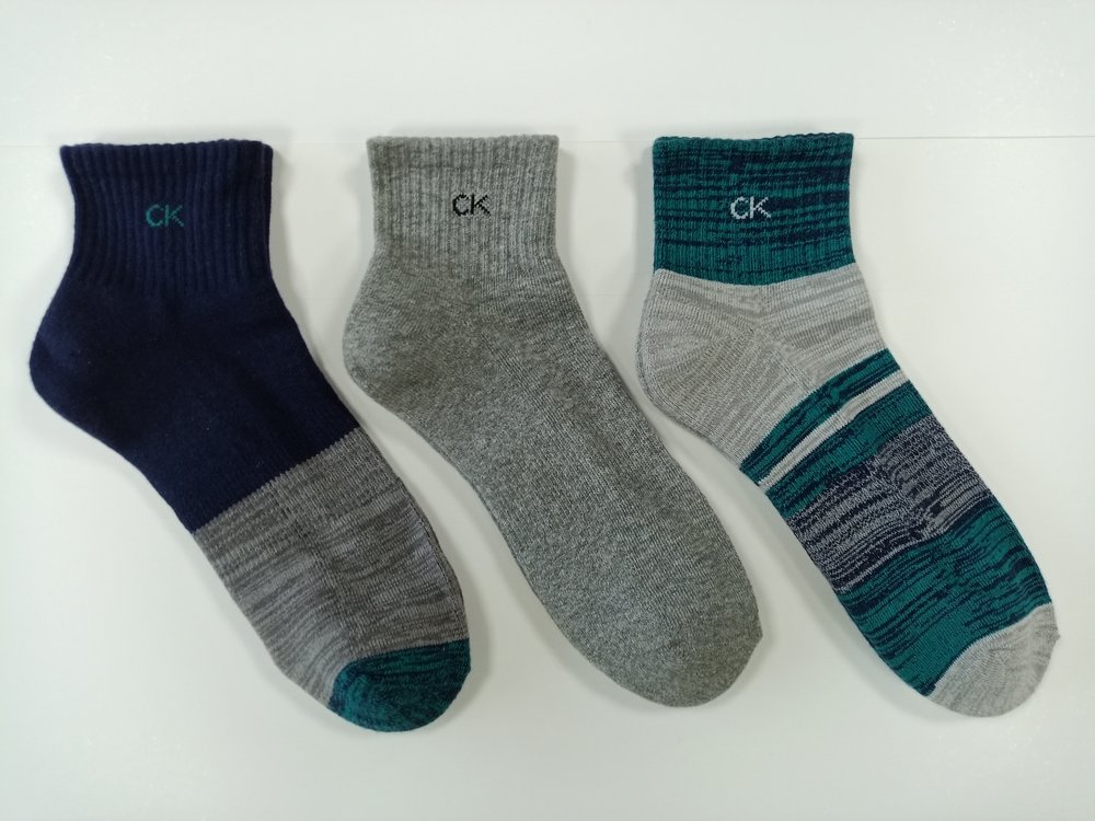 GOTS organic cotton socks with hangtag showing the certification mark